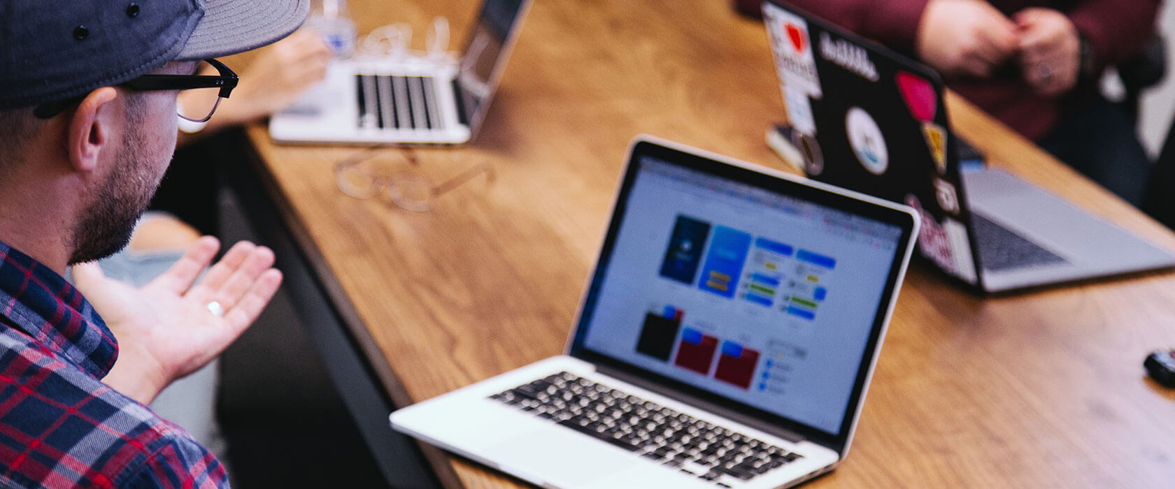 startup workers on their computers